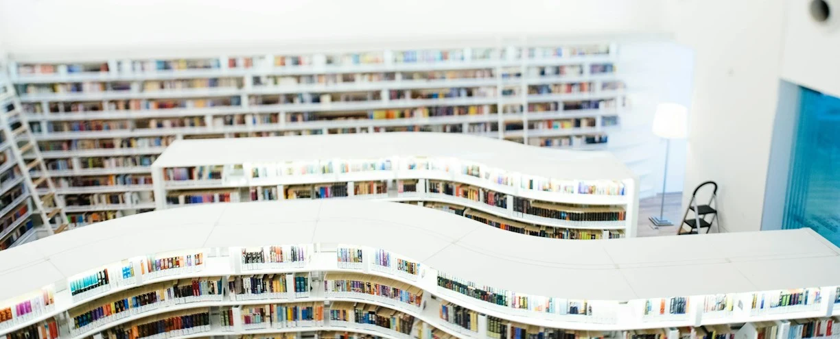 a room filled with lots of white books